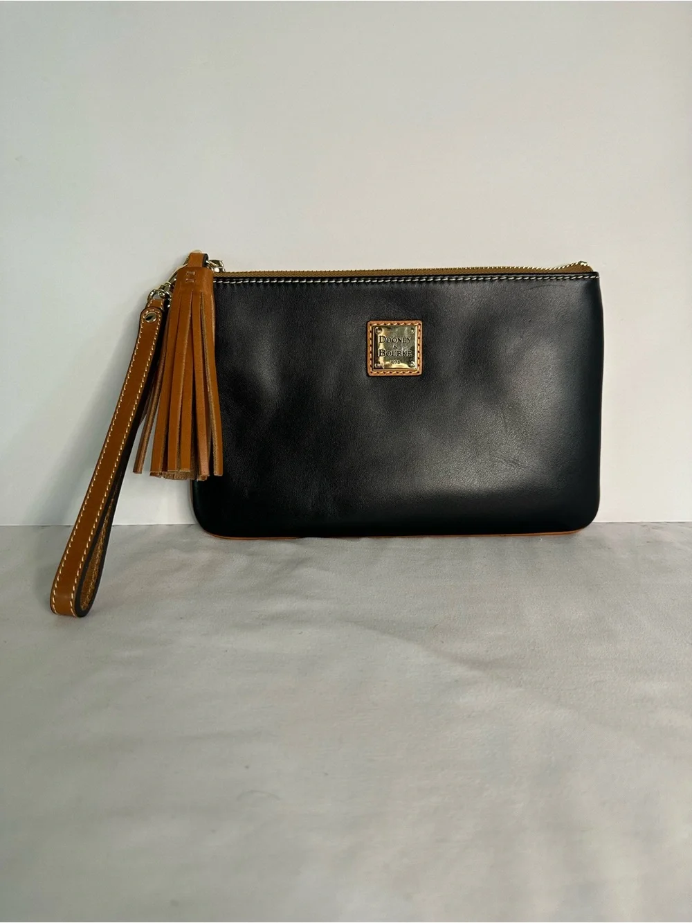 Dooney & Bourke Black Smooth Wexford Leather Carrington Wristlet with Tan Tassel